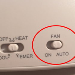 showing the auto switch on a thermostat